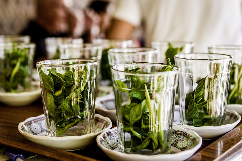 Tea herbs in drinking glasses.
