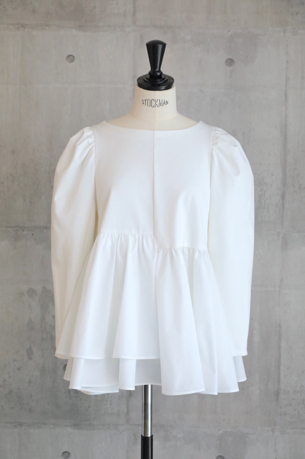 em. 予約販売 asymmetry peplum tops