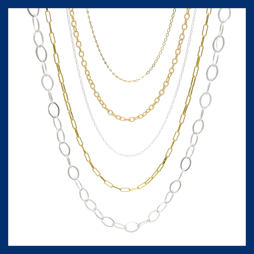 Gold and silver chains in a swoop.