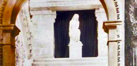 Statue and curtain