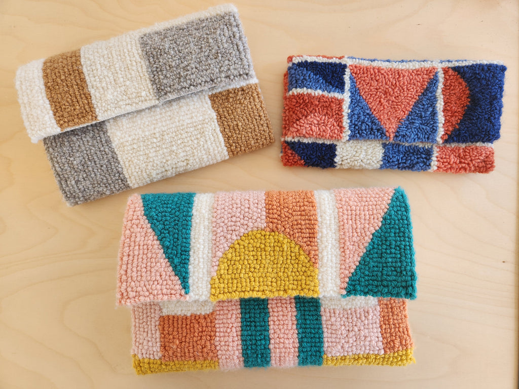 three fine oxford punch needle clutch purse examples