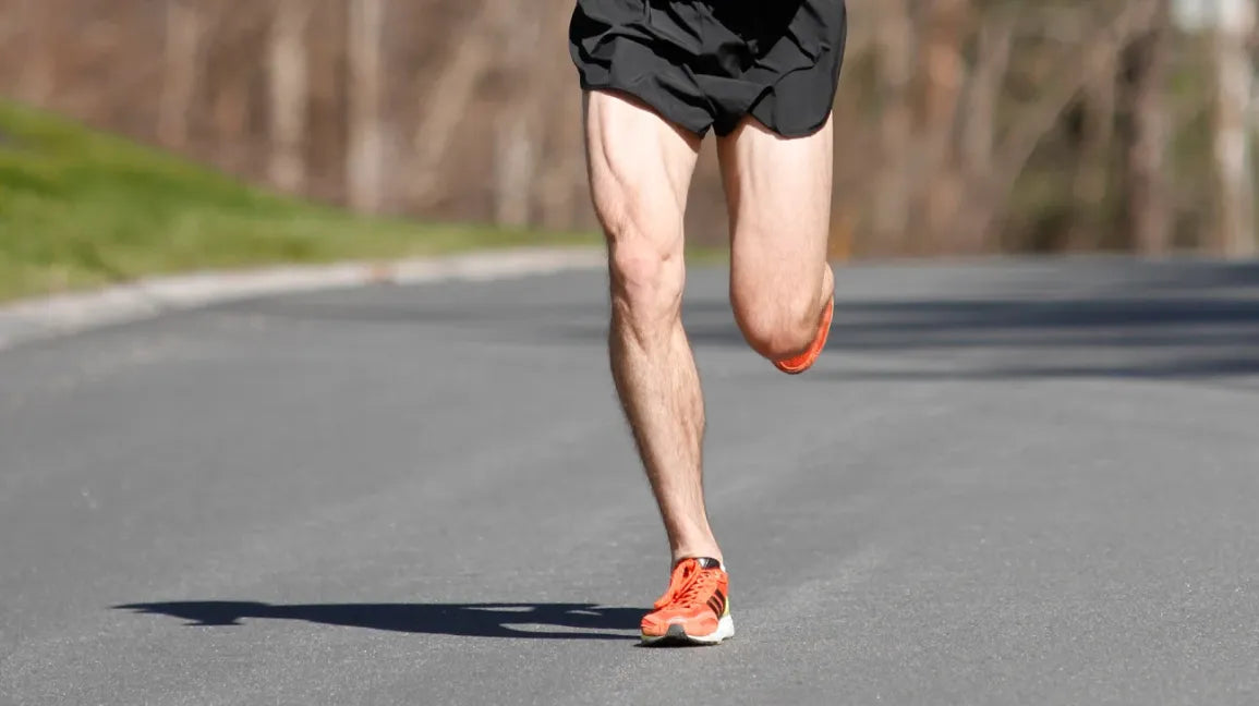 male with strong calves running