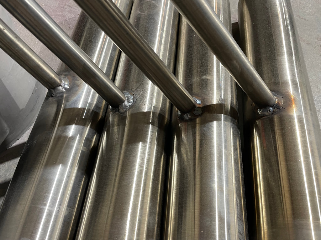 Shafts welded to pipes