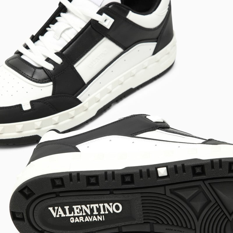 Shop Valentino Garavani Low Top Freedots Trainer In Black/white Calfskin Men