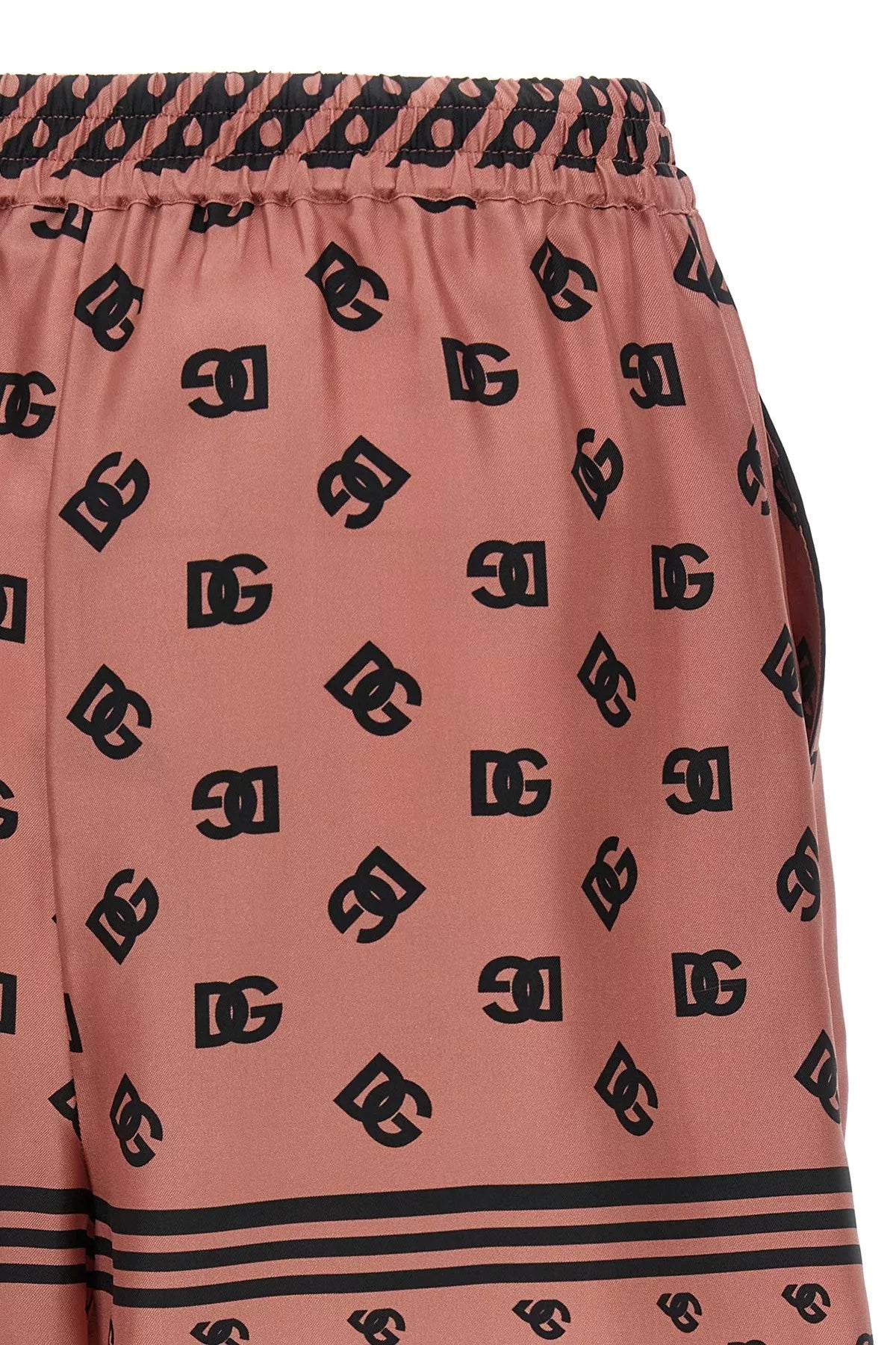 Dolce & Gabbana Pink Bermuda Shorts With Dg Logo Printed All-over In Silk Woman In Pink