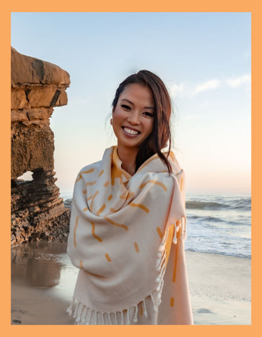 Photo of founder wrapped in Sun Towel