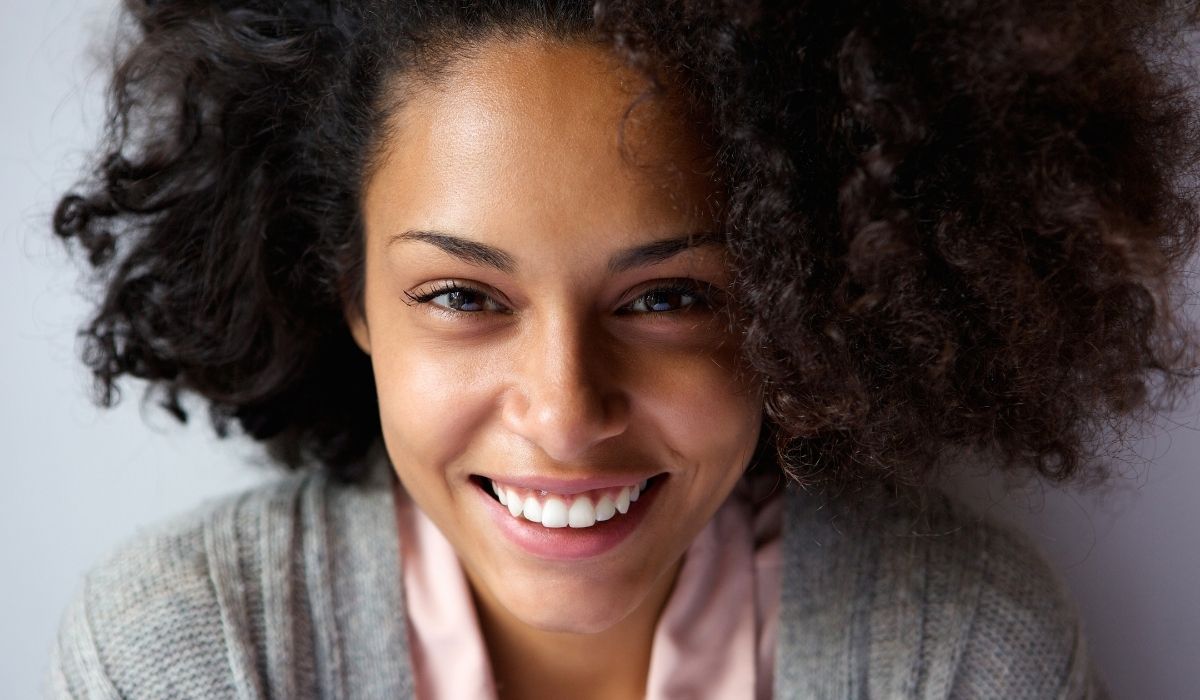 Beautiful African American woman face smiling