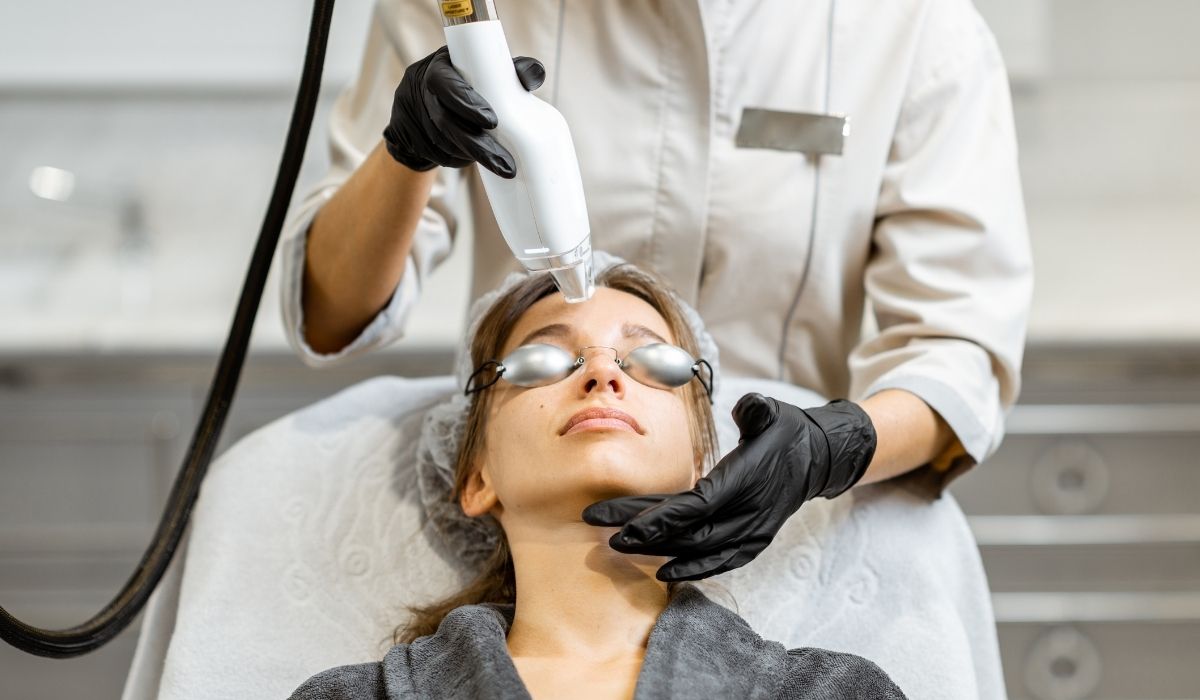 Woman getting a laser rejuvenation skin treatment