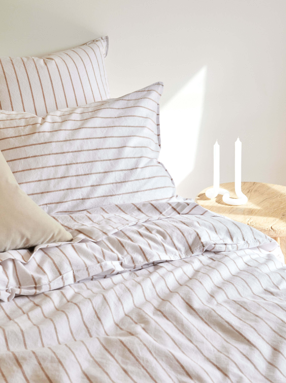 beige and white striped duvet cover