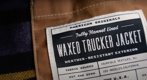 Huckberry waxed trucker jacket close up of tag