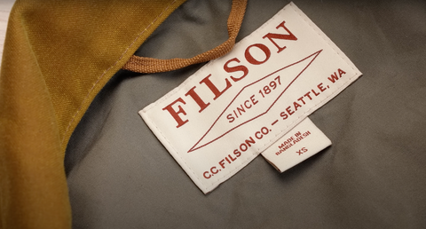 Filson waxed cruiser jacket close up of tag and lining