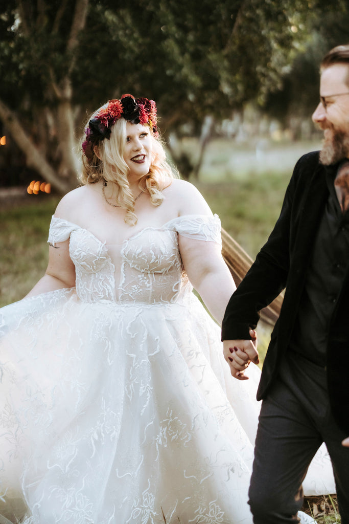 Chantelle and Dave share a loving look as they walk down the aisle together.