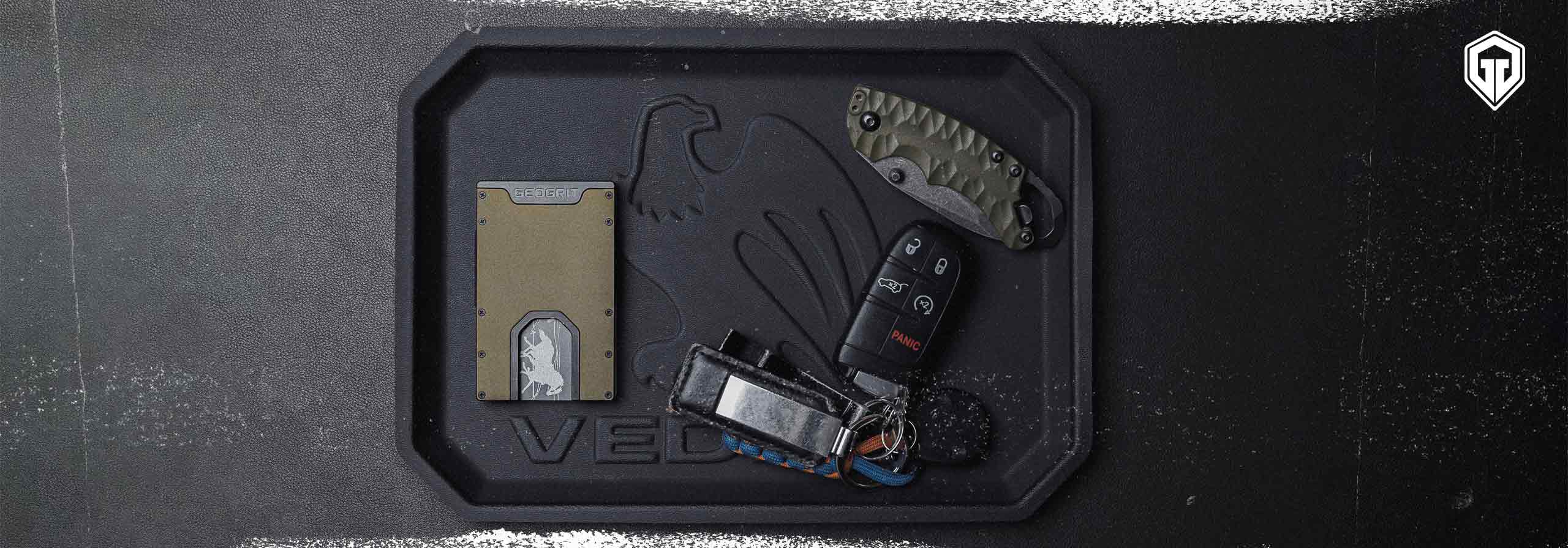 A Vedder Holsters EDC Tray and other EDC items like a GeoGrit Wallet