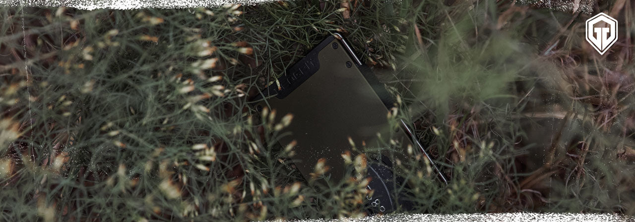 How long do wallets last - Geogrit wallet laying on grass photography