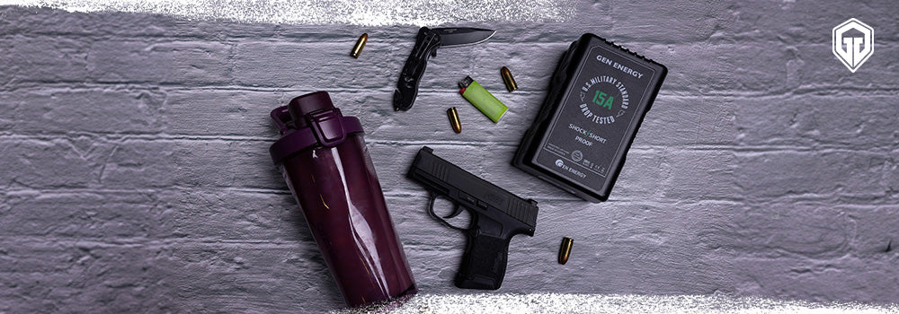 A handgun, a pocket knife, a lighter and more - Geogrit Stock Photography