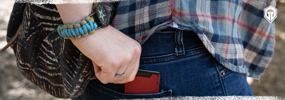 Person wearing paracord which they use to make a band and watch.