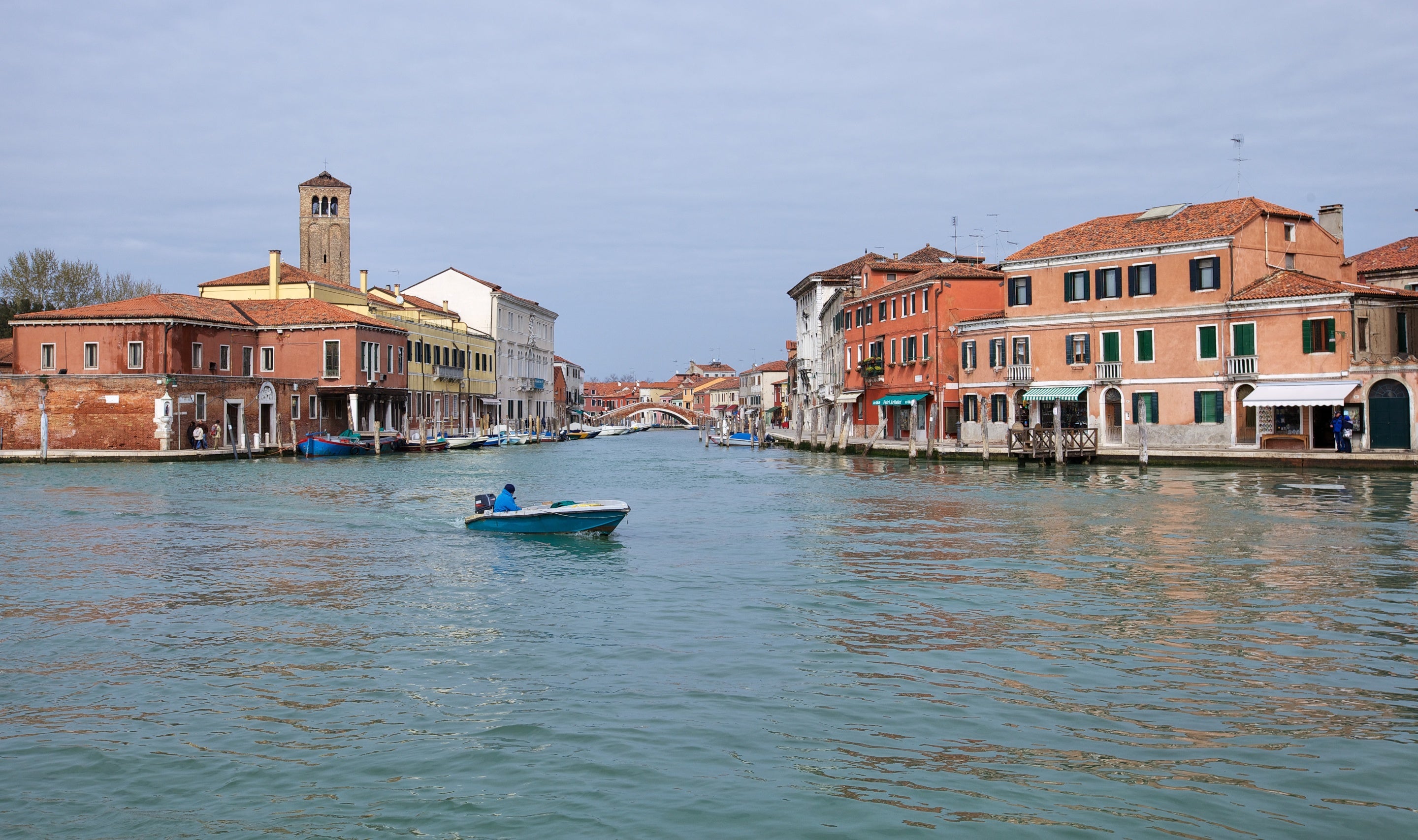 View from water entering Murano, Italy by boat