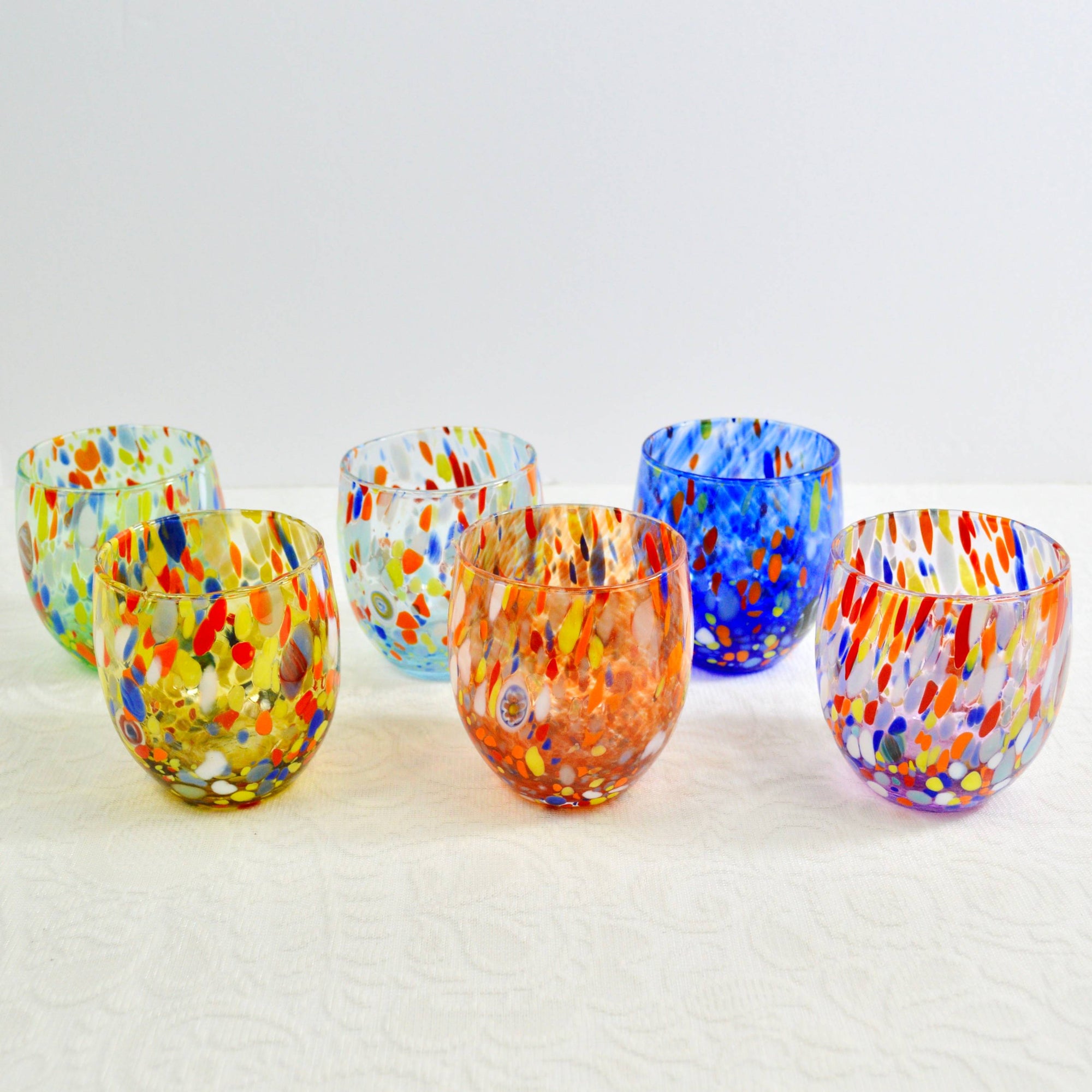 https://cdn.shopify.com/s/files/1/0597/3452/4084/products/murano-glass-short-drinking-glasses-guiliana-set-of-six_2000x.jpg?v=1677103359