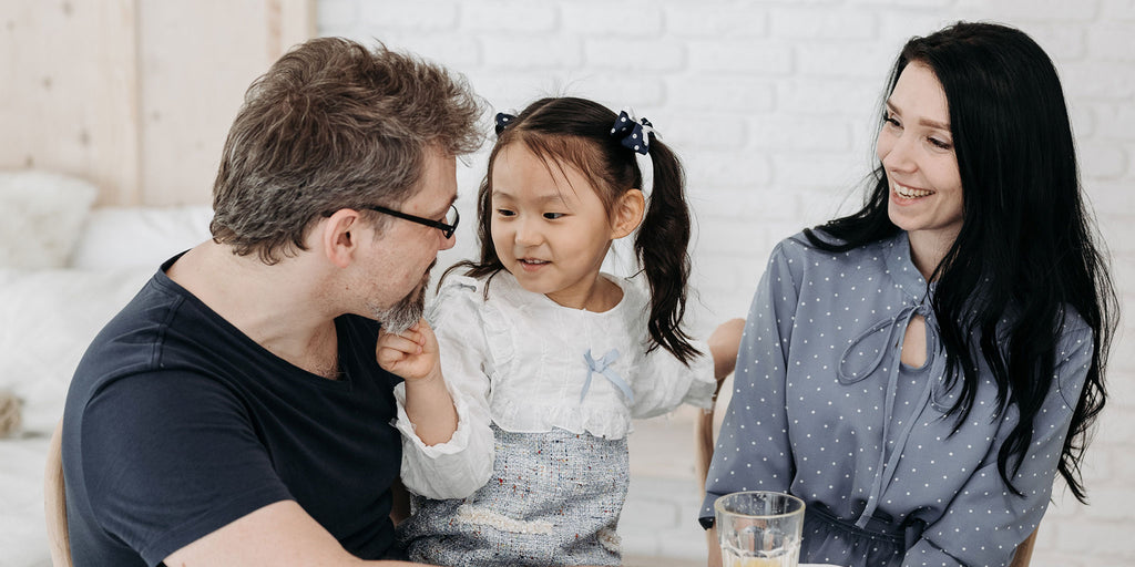 Parents talking to daughter