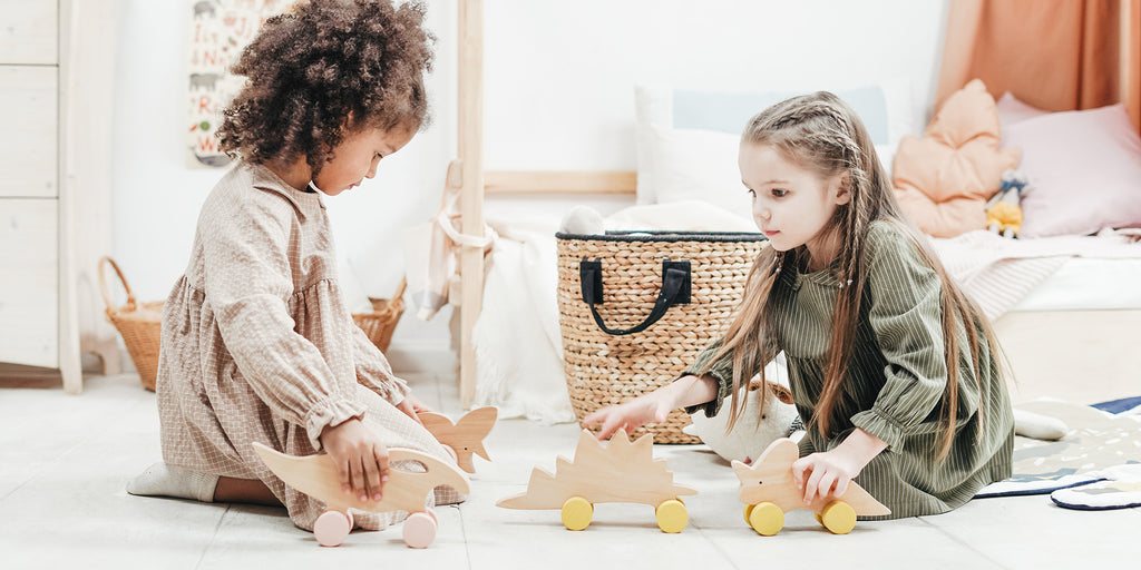 Children sharing toys