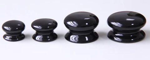 black ceramic cabinet knobs in a variety of sizes