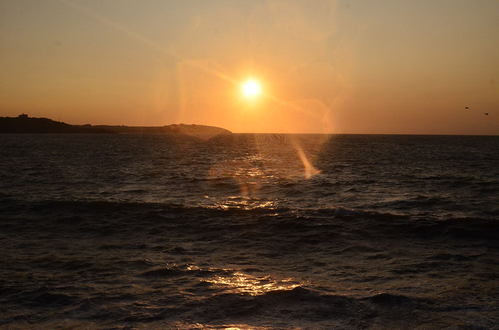 Sunrise over Falmouth beach