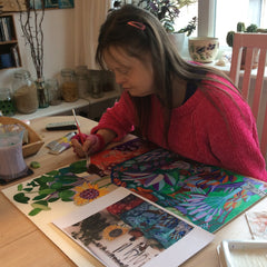 Disabled artist, tazia fawley  hard at work creating artwork for the art rabble website