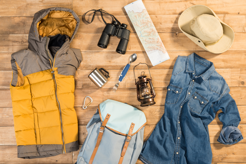 camping clothes with different type of equipment