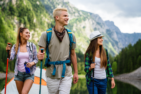 group of 3 hikers hiking in mountains