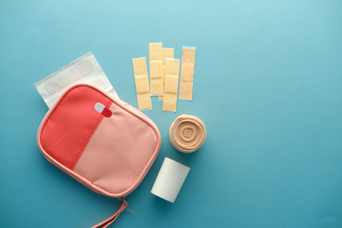 first aid kit with different types of bandages