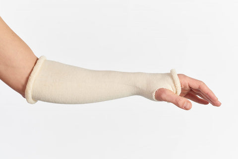man with tubular bandage on arm