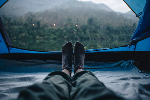 legs with socks in a tent