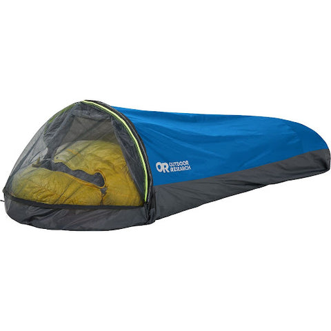 A blue bivy sack with a see through net on the front and a yellow pillow inside