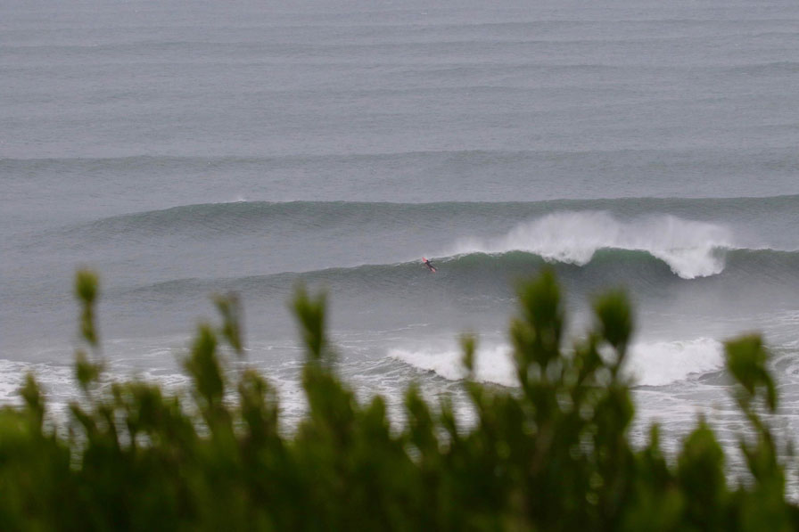 One of the boys scratching for the horizon.