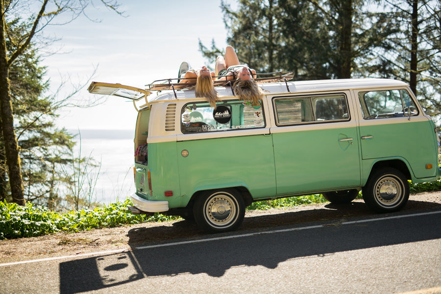Hanging by the sea on a Volkswagen Bus