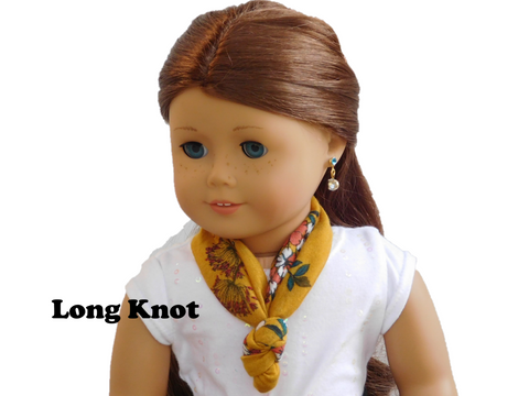 American Girl Doll wearing a Mustard Floral Infinite Scarf around her neck