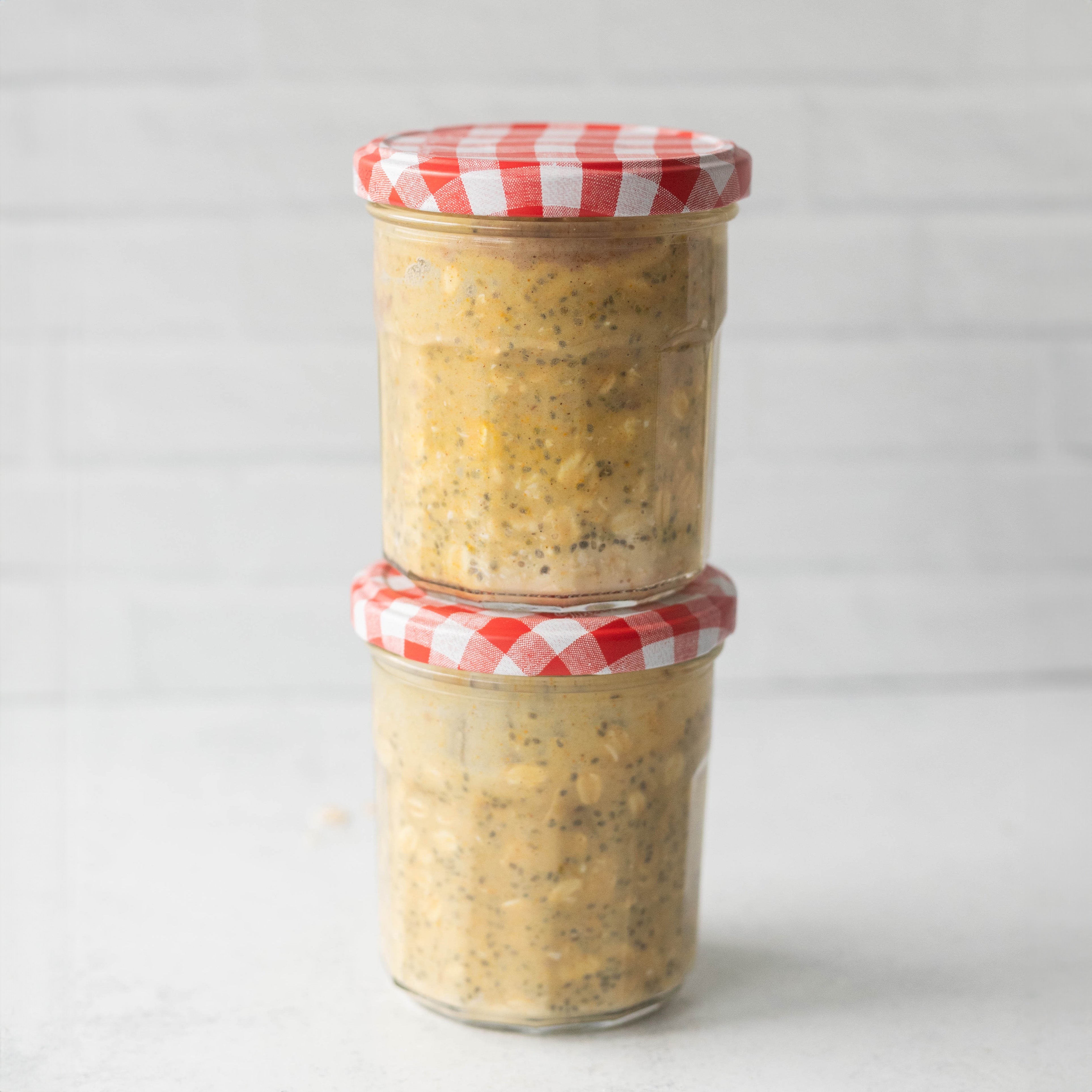 Stacked Jars Of Golden Milk Oats