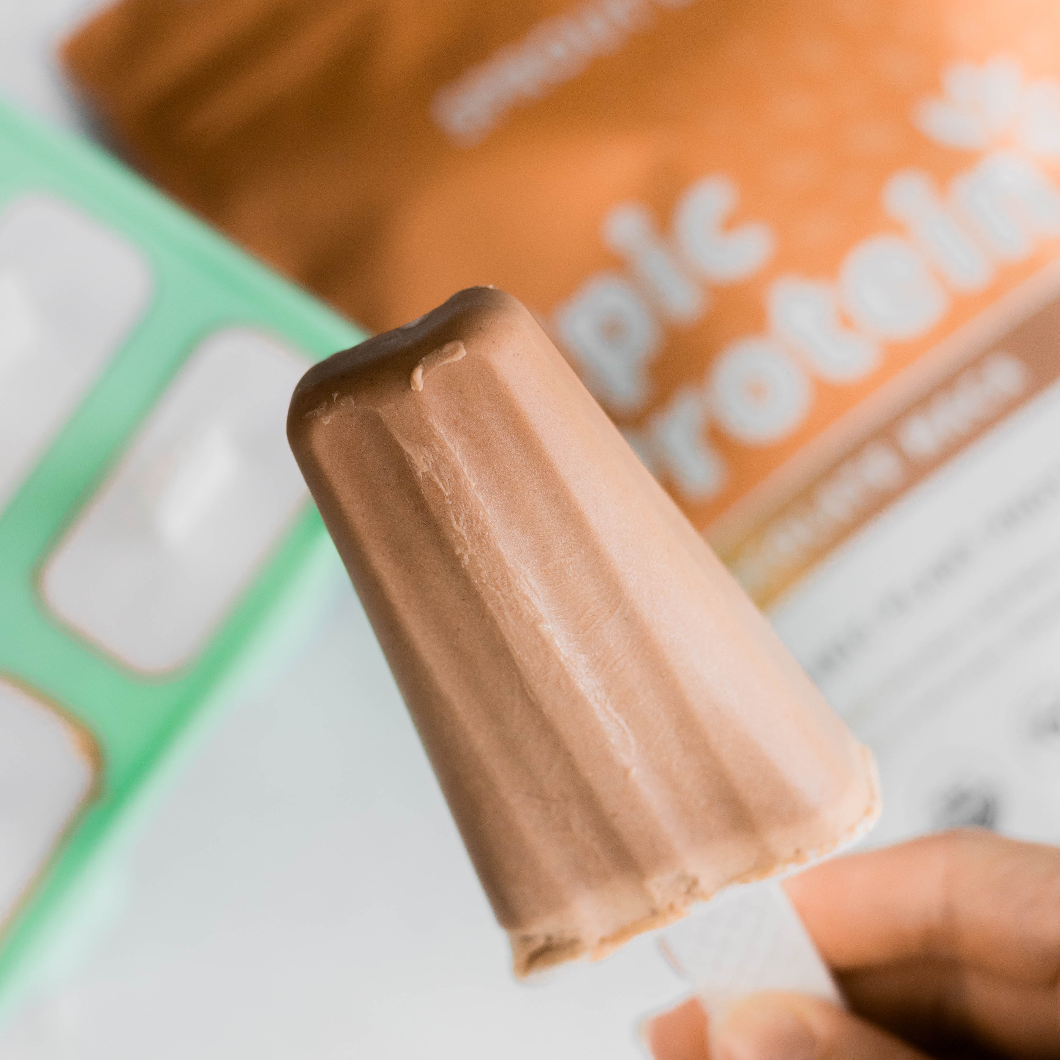 Healthy Chocolate Popsicle in Hand