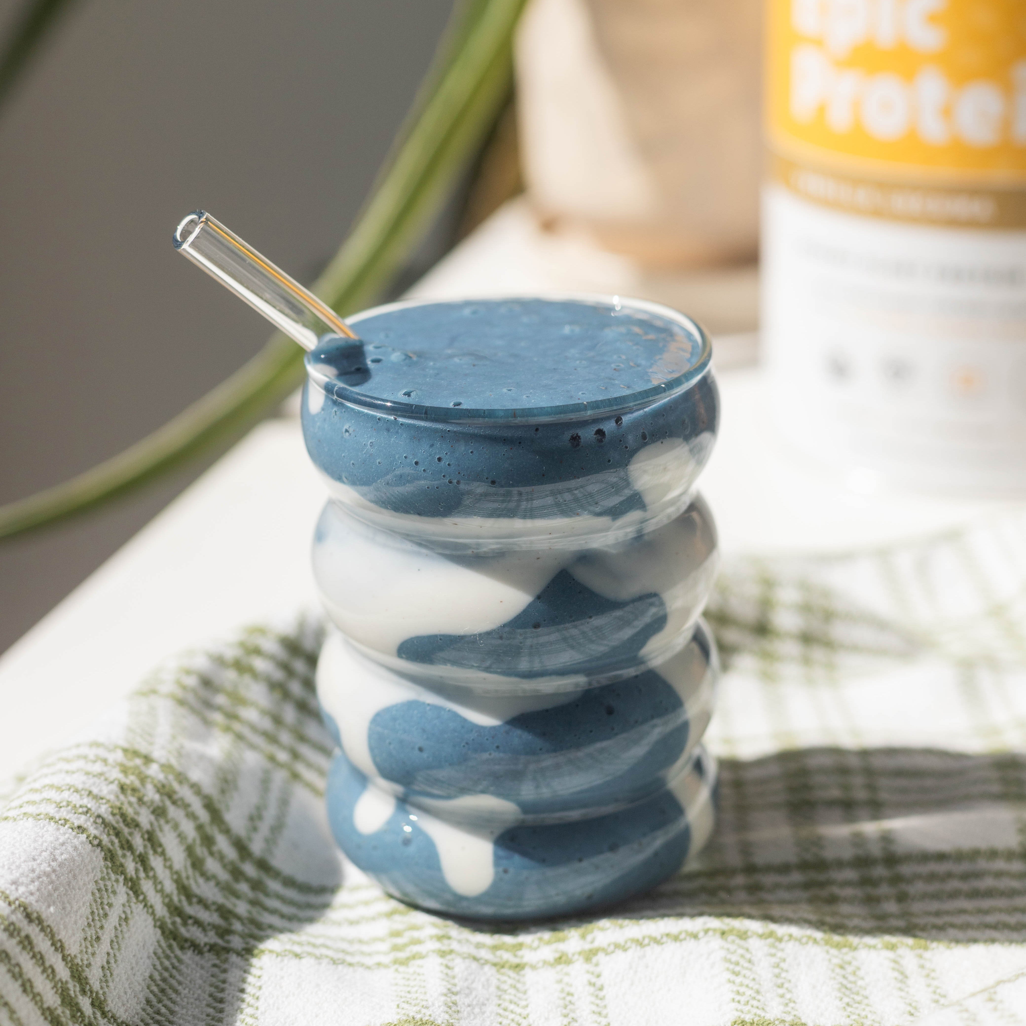 Blue Protein Smoothie in Glass With Straw