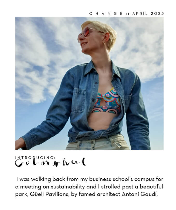 Woman wearing a multicolor sports bra and denim shirt. Text says: Introducing Colorwheel. I was walking back from my business school's campus for a meeting on sustainability and I strolled past a beautiful park, Guell Pavilions, by famed architect Antoni Guadi.
