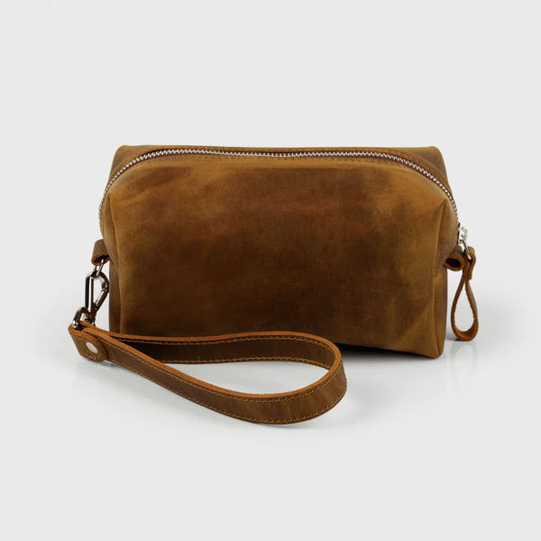 traveling in style with leather makeup bags