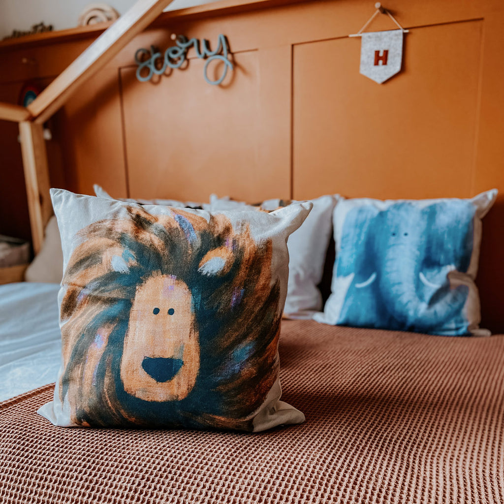 Lion children's cushion cover on kid's bed