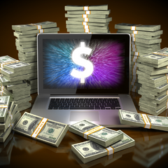 money around laptop