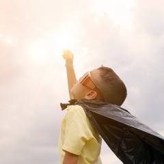 kid dressed as superhero