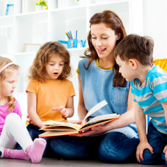 Mom reading story to kids