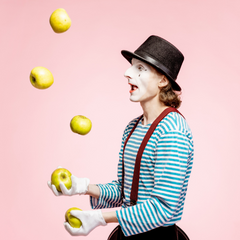 clown juggling lemons