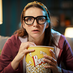 woman eating popcorn