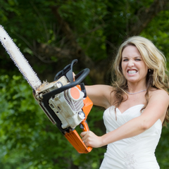 woman using chainsaw