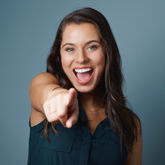 woman pointing at reader