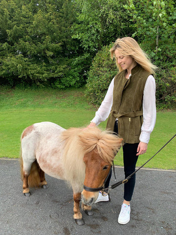 Co-Founder Lucia Ruck Keene in the Belted Suede Gilet in Olive